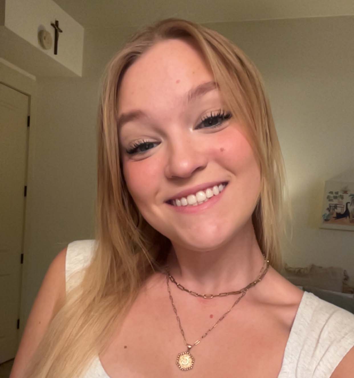 A person taking a selfie  AI-generated content may be incorrect.
